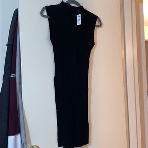 express sleeveless black turtleneck  slit small